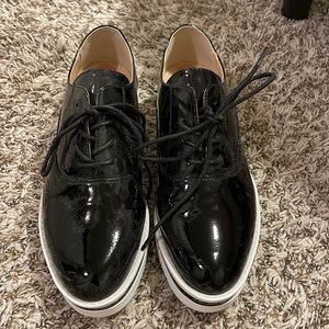 Black metallic Madden Girl platform sneaker. Size 7.5 and never worn!